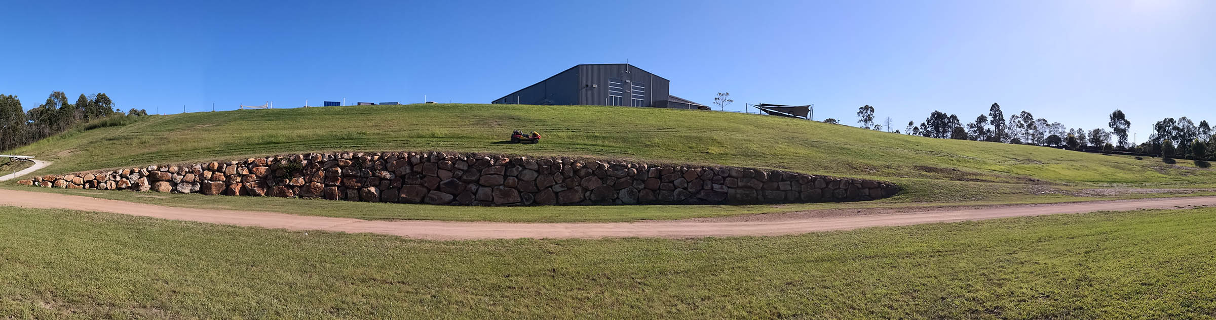 College campus mowing – difficult embankment 